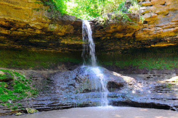istock Beautiful waterfall in the mountain . 1163033410