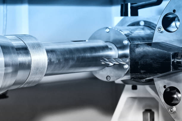 istock Metal billet is machined on milling machine. Blue toned 1163033641