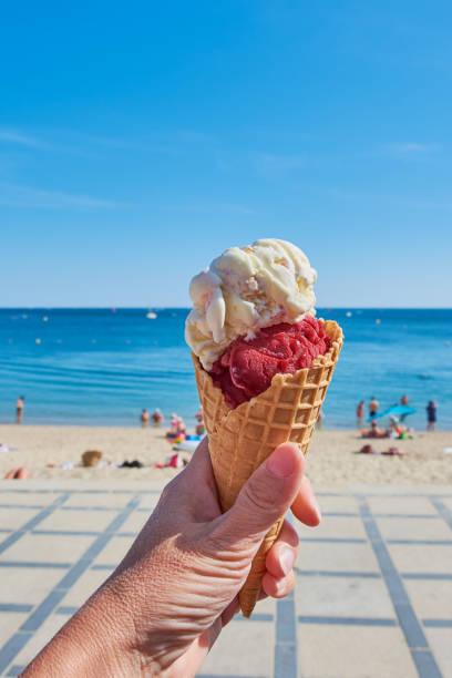 istock ice cream cone at a beach in France 1163038273