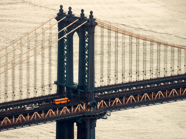 Manhattan Bridge At Sunset Manhattan Bridge in New York City, USA at sunset new york marathon photos stock pictures, royalty-free photos & images