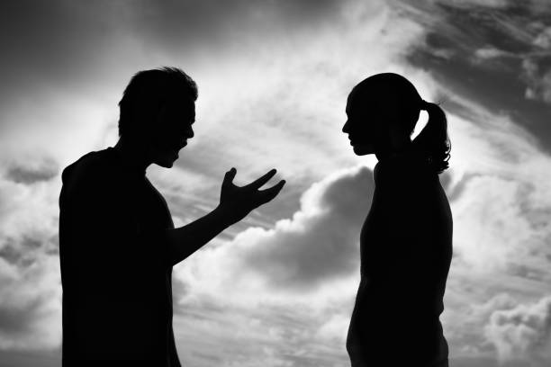 Upset couple arguing Upset couple fighting arguing with each other arguing stock pictures, royalty-free photos & images