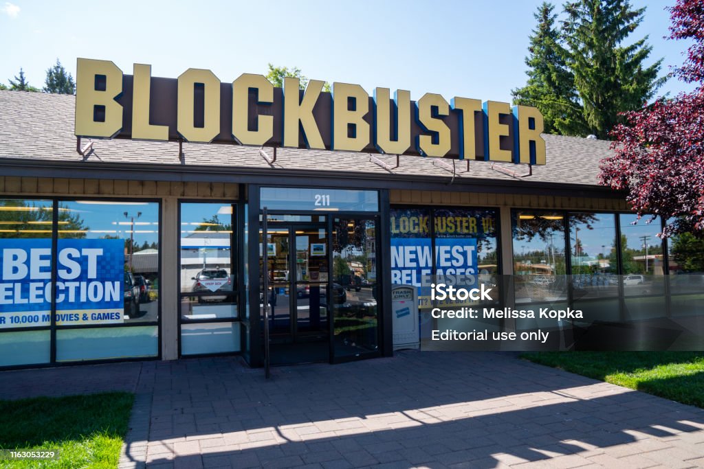 Exterior of the last remaining Blockbuster Video  rental store in the United States of America Bend, Oregon - July 8, 2019: Exterior of the last remaining Blockbuster Video  rental store in the United States of America Movie Stock Photo
