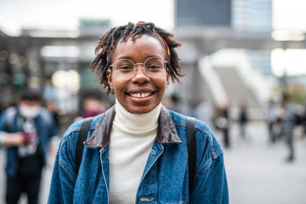 istock Relaxed Young African Female Vacationer Exploring Tokyo 1163059969