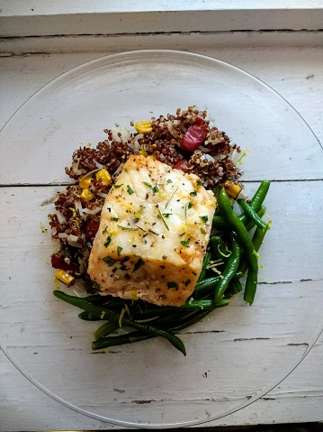 Baked Cod With Red Quinoa Pilaf And Green Beans Stock Photo - Download