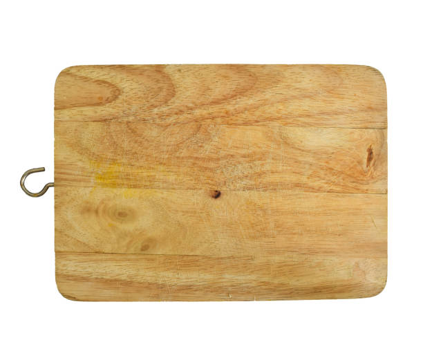 istock Rustic wooden cutting board isolated on white background 1163066208