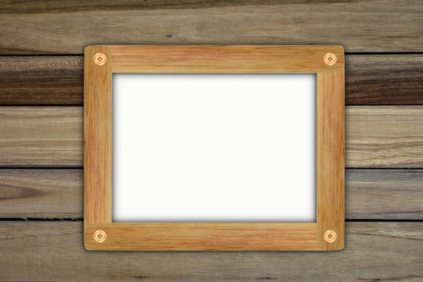 istock Empty wooden frame, hanging on wood panels background. Retro style design 1163066276