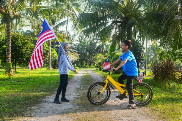 istock Happy Malaysian children playing together during Merdeka celebration 1163077514