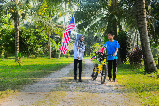 istock Happy Malaysian children playing together during Merdeka celebration 1163077615