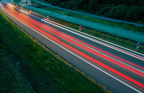 istock lights of cars with night 1163087662