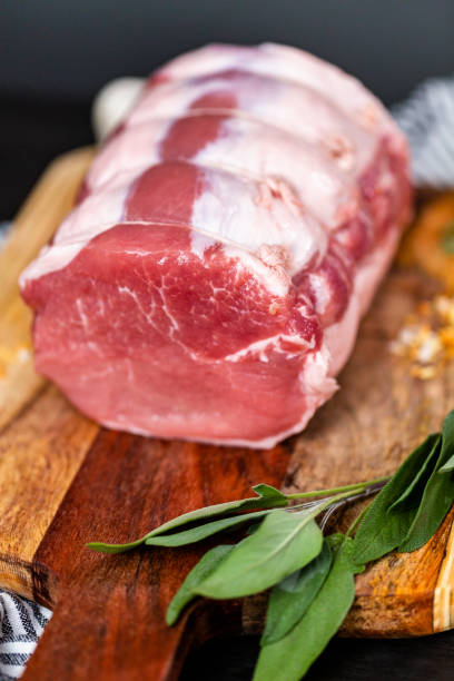 istock Uncooked boneless pork roast on the cutting board. 1163087909
