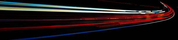 istock lights of cars with night 1163087916