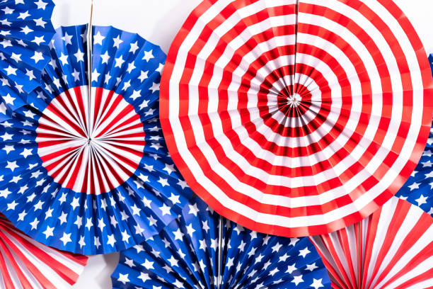 istock Red, white, and blue paper fans for July 4th celebration. 1163088655