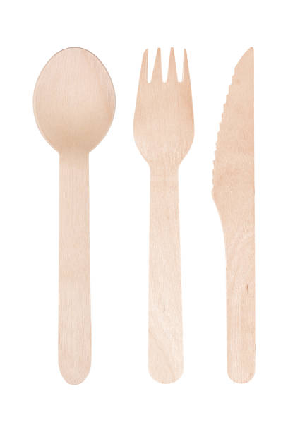 istock Wooden knife, fork and spoon isolated on white background 1163088820