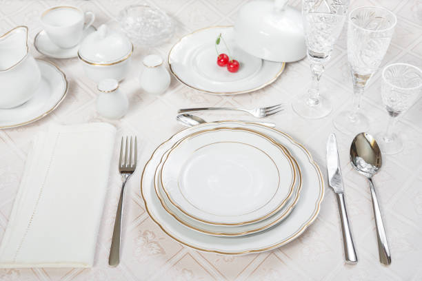 istock Two cherries lie on a white porcelain plate 1163089685