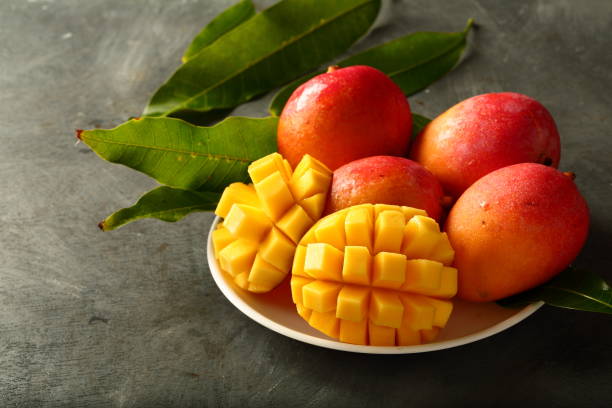 istock Plate of delicious ripe mango fruit salad 1163091519