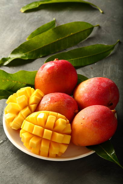 istock Plate of delicious ripe mango fruit salad 1163091544