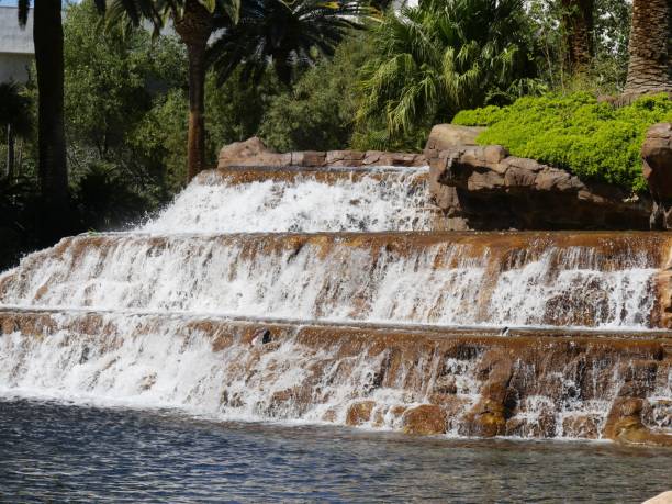 istock Waterfalls in a landscaped garden 1163096954