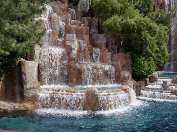 istock Waterfalls in a landscaped garden 1163096977