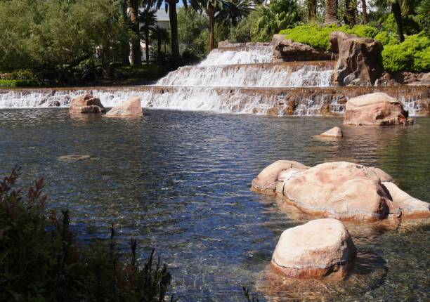 istock Waterfalls in a landscaped garden 1163097009
