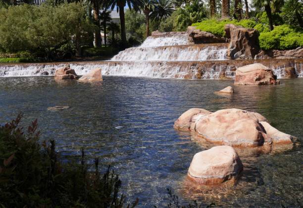 istock Waterfalls in a landscaped garden 1163097012