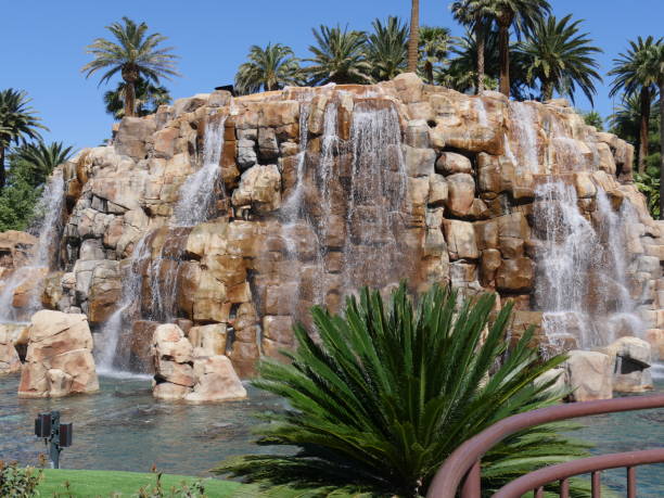 istock Waterfalls in a landscaped garden 1163097158