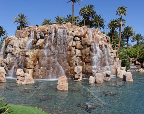 istock Waterfalls in a landscaped garden 1163097159
