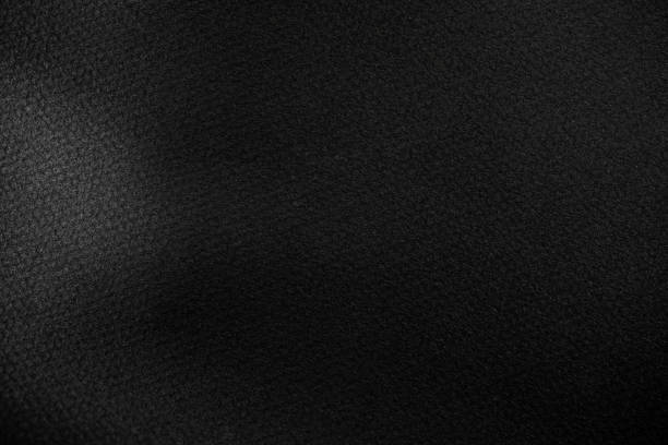 istock black wrinkled paper texture for you design background. 1163101257