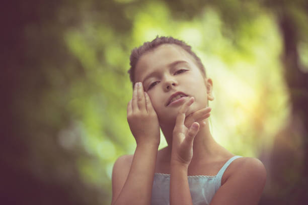 Summer is here and I feel wonderful  Little girl outdoor.