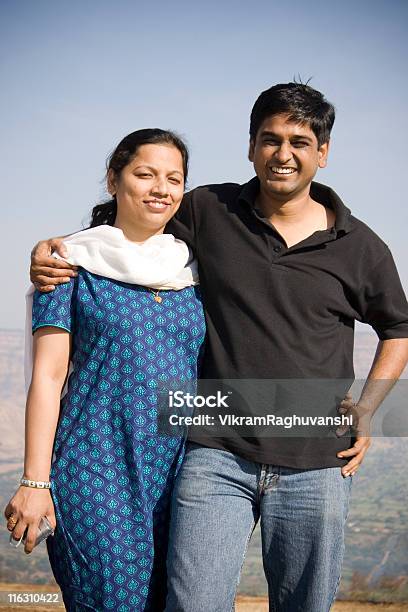 Happy Indian Couple Husband Wife Embrace Cheerful Lifestyle Vertical Stock Photo - Download Image Now