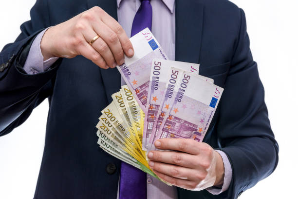istock Male hands offering euro banknotes in fan 1163105591