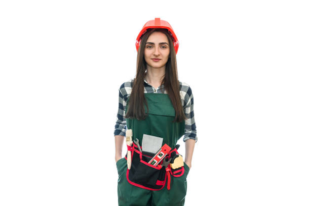 istock Young woman in coverall isolated on white 1163105637