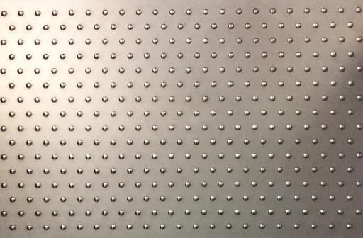 Steel plate with anti slip buttons