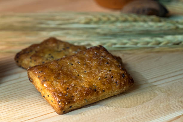 istock cookies lying on wooden table, on biscuits, honey 1163115065