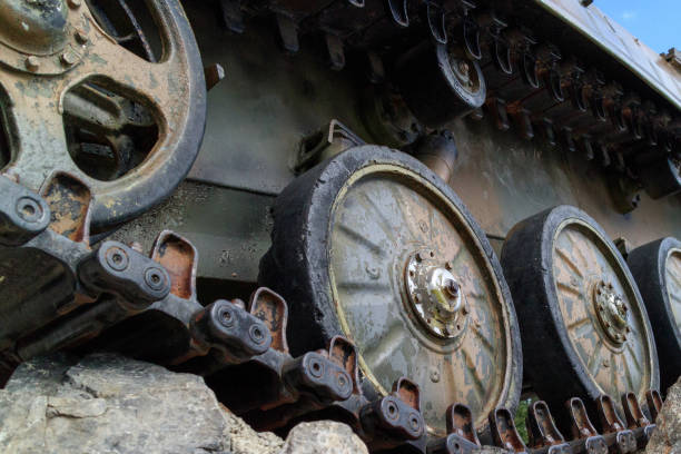 istock caterpillar military vehicles in the vicinity 1163115705