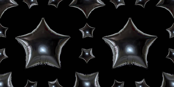 istock Black foil star balloon object for birthday party. Seamless pattern on black background. 1163124056