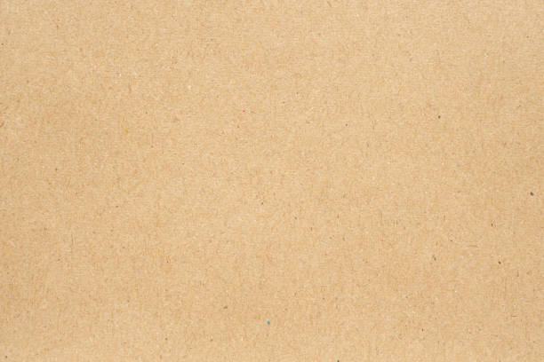 istock Old brown recycle cardboard paper texture background 1163127413