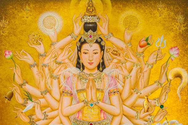 dipingendo guanyin buddha. - buddha thailand spirituality wisdom foto e immagini stock