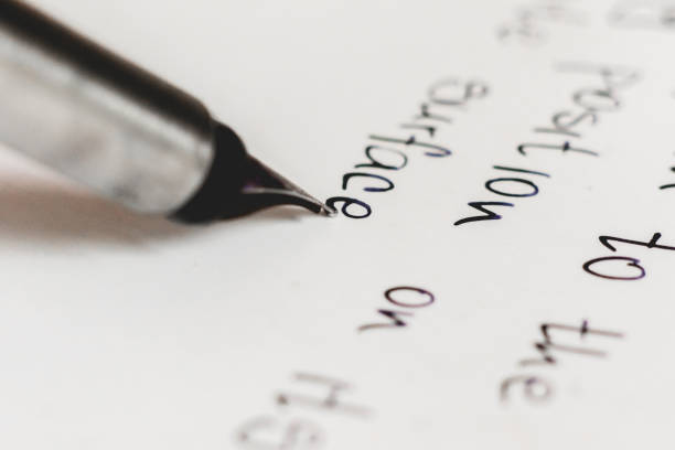 istock macro shot of fountain pen writing on white surface 1163129026