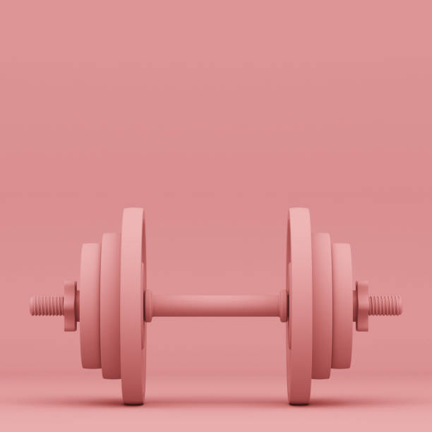 istock dumbbell isolated on pink background 1163130069