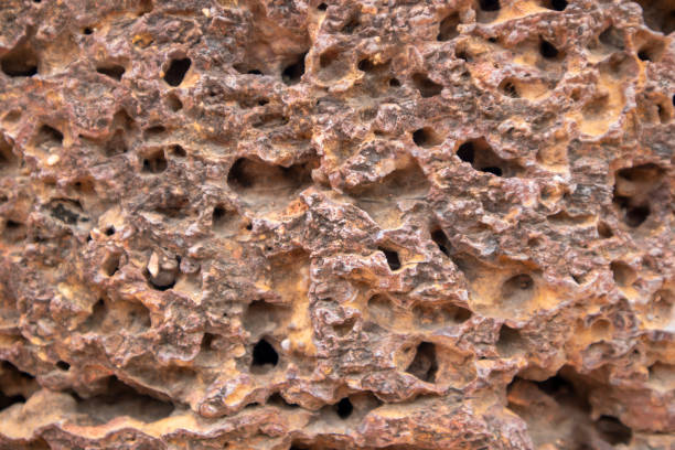 istock The background of the old wall was destroyed, built from red bricks. 1163130139