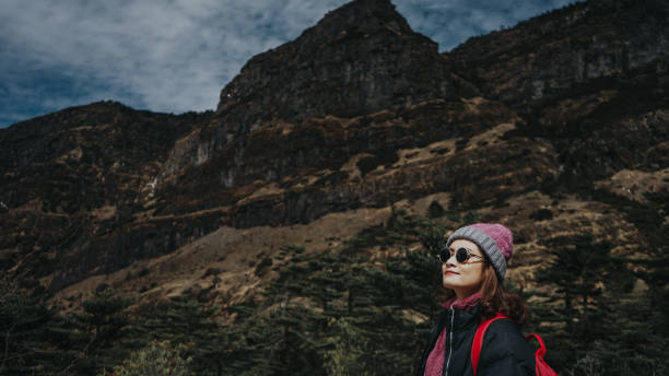 istock Traveler Looks at Landscape view 1163131182