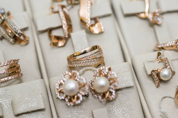 istock Jewellery with gemstones at showcase in store 1163133732