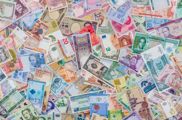 istock World money collection of different countries as background 1163133940
