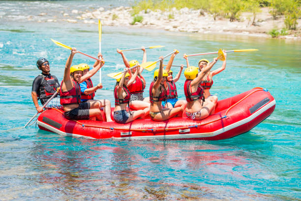 group of people white water rafting - team sport rafting white water rafting rapid imagens e fotografias de stock