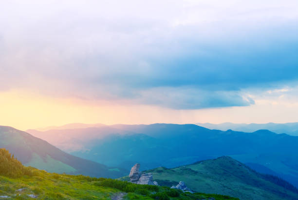 istock beautiful summer mountain scene, mount slope at the sunset 1163134958