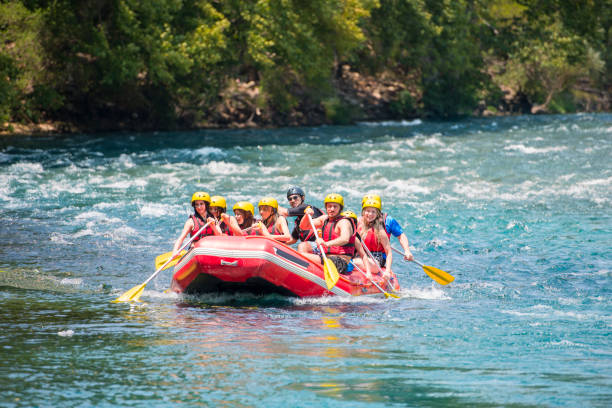 group of people white water rafting - team sport rafting white water rafting rapid imagens e fotografias de stock