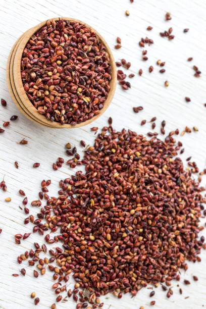 istock Box with red millet and millet grain on a white background 1163137131