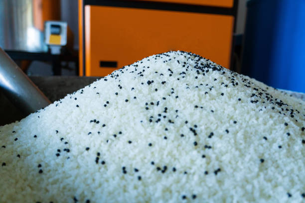 istock raw plastic material white granules in metal box 1163137422