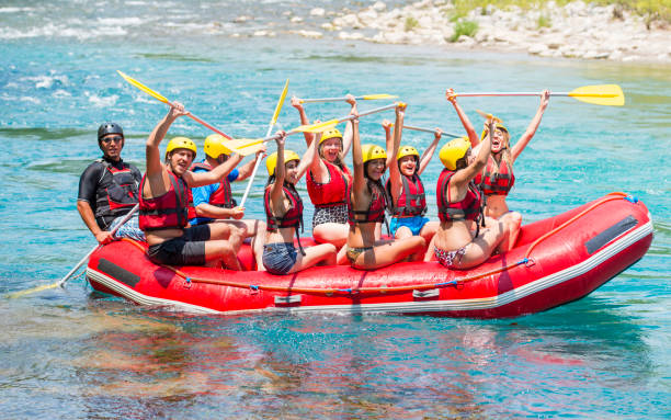 group of people white water rafting - team sport rafting white water rafting rapid imagens e fotografias de stock