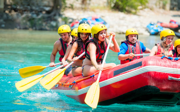 istock Group of people white water rafting 1163140876